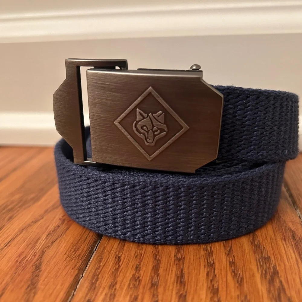 NWOT Cub Scout wolf buckle uniform belt. Blue canvas cut to fit size.